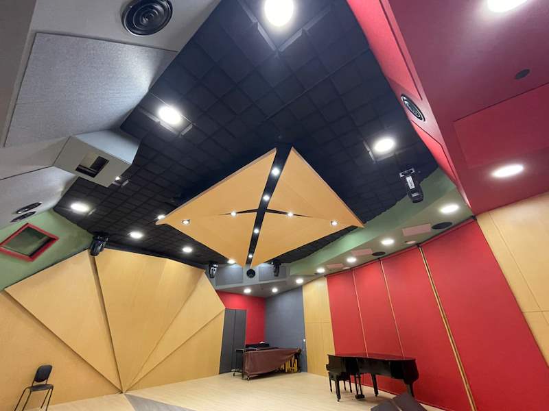 Ceiling detail - timber facets with downlights against a black-painted ceiling - Music rehearsal studio fit-out with a faceted timber ceiling (Studio) | Wong Lye, BCA General Builder Class 2, Singapore