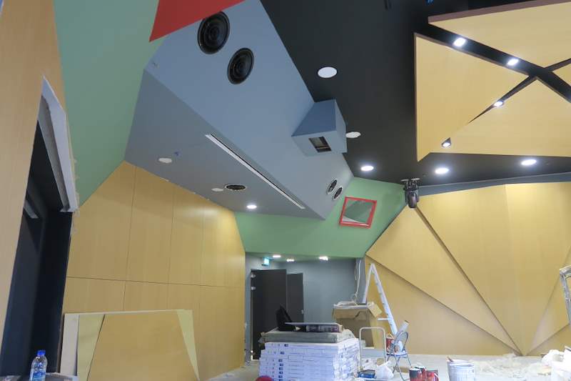 Timber wall panels and ceiling with recessed speakers - Music rehearsal studio fit-out with a faceted timber ceiling (Studio) | Wong Lye, BCA General Builder Class 2, Singapore