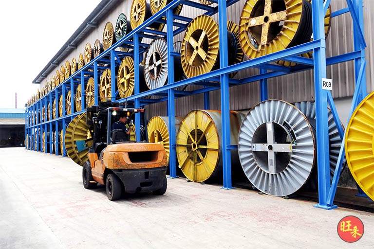 Forklift working beside the loaded drum racks - Heavy-duty cable drum racking in a cable yard (TSE) | Wong Lye, BCA General Builder Class 2, Singapore