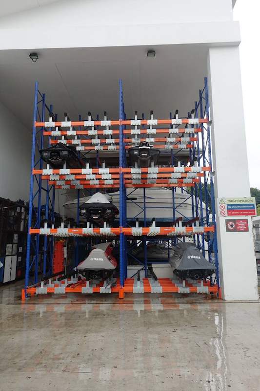 Multi-tier jet ski rack inside a shed bay, seen head-on - Heavy-duty racking for boats and jet skis (Sentosa) | Wong Lye, BCA General Builder Class 2, Singapore