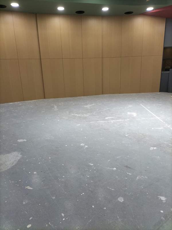 Timber panels along a wall over the bare concrete floor - Music rehearsal studio fit-out with a faceted timber ceiling (Studio) | Wong Lye, BCA General Builder Class 2, Singapore