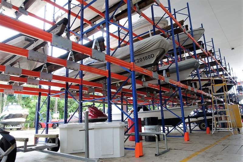 Two-tier boat racks along the shed with bunk brackets in the foreground - Heavy-duty racking for boats and jet skis (Sentosa) | Wong Lye, BCA General Builder Class 2, Singapore